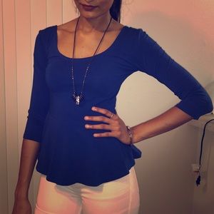 Deep blue scoop neck peplum top from Express.
